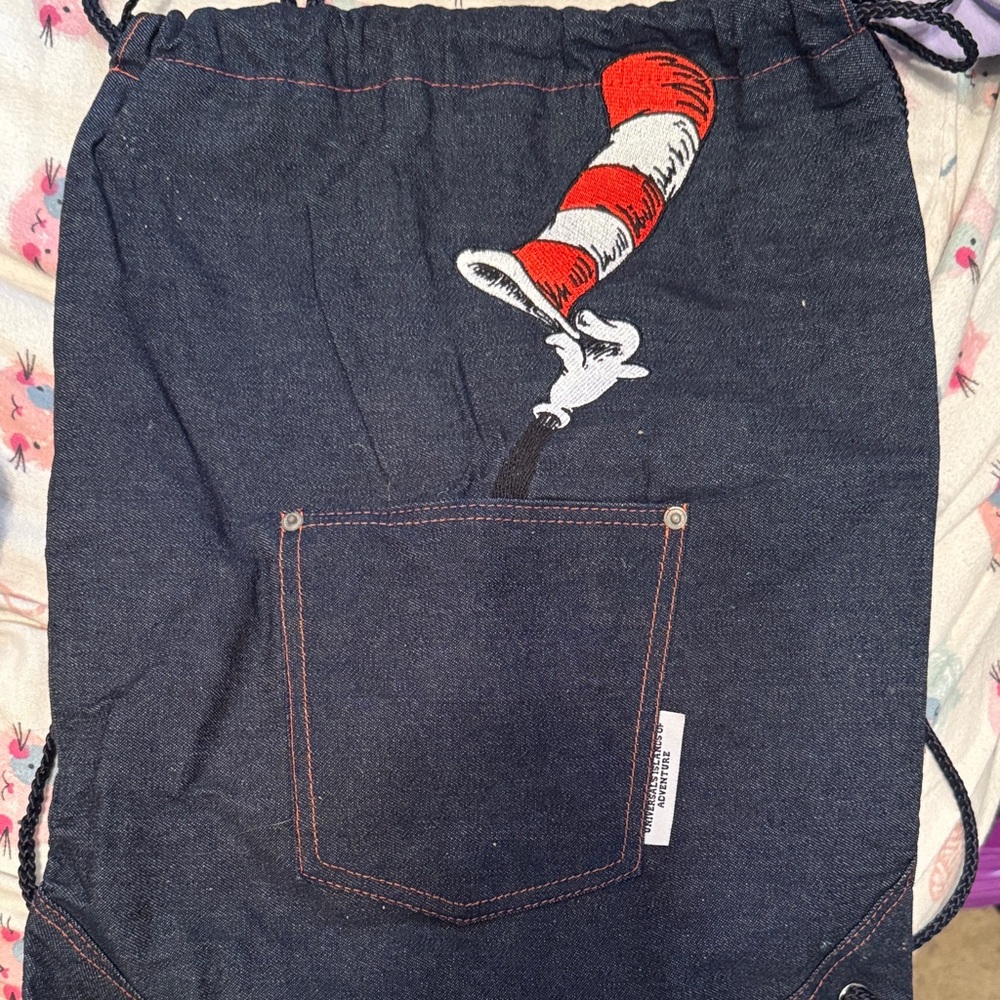 Denim Drawstring Bag with Red and White Hat Design